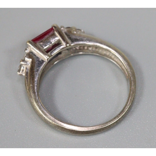 229 - 9ct white gold ruby and diamond ring.  Size I 1/2, 3.1g approx.  (B.P. 21% + VAT)