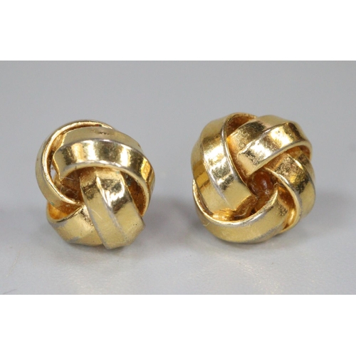 247 - Pair of yellow metal knot earrings.  (B.P. 21% + VAT)