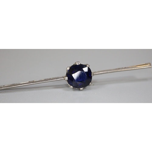 256 - Sapphire bar brooch set in white metal.  Pin detached.
Approx weight 3.1 grams.
(B.P. 21% + VAT)