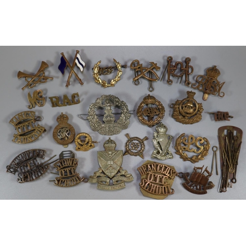 303 - Collection of assorted British Military cap badges, shoulder flashes and other related items, to inc... 