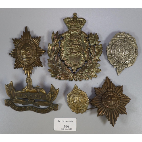 306 - Collection of British Military helmet plates, some Scottish and others.  (B.P. 21% + VAT)