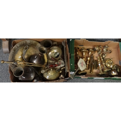 333 - Two boxes of metalware to include: brass candlesticks, a brass cat matchbox holder, chambersticks, b... 