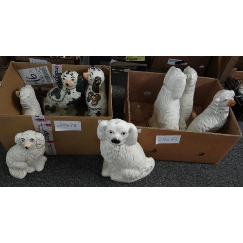 339 - Two boxes containing Staffordshire seated fireside spaniels. (4 pairs)
(B.P. 21% + VAT)