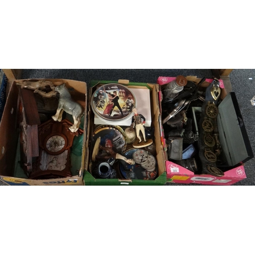 358 - Three boxes of oddments, to include: heavy metal chess set, horse brasses on leather straps, Star Wa... 