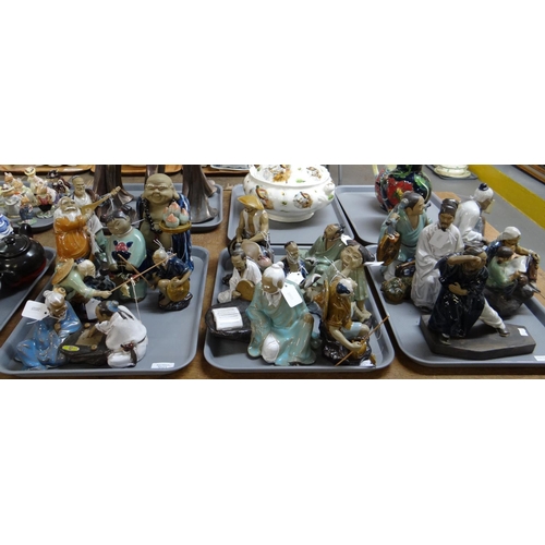 371 - Three trays of mainly Chinese mud men figurines of immortals, Buddha etc.  (20 approx.)  (3)  (B.P. ... 