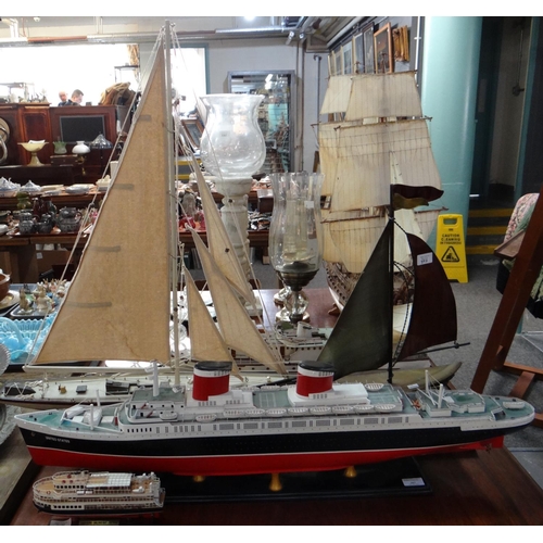 397 - Group of assorted ship models, to include: the liner 'United States', a J class racing yacht or simi... 