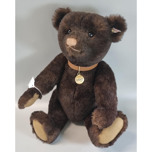 458 - Modern Steiff growling teddy bear in original box.  (B.P. 21% + VAT)