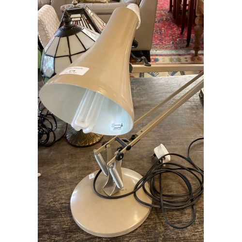 478 - Modern angle poise table lamp on a circular base.  (B.P. 21% + VAT)