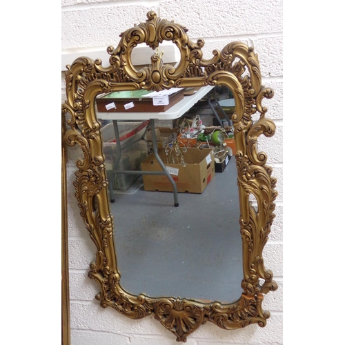 489 - Rococo style gilt framed mirror (modern).  96x56cm approx. 
 (B.P. 21% + VAT)