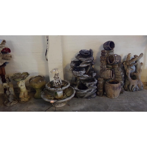 501 - Collection of garden ornaments to include: various plastic water features and baths, a bird bath wit... 