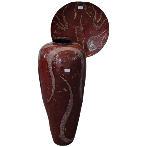 72 - Large unusual modern abstract red ground and lacquered baluster floor vase together with a matching ... 