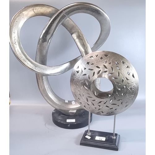 78 - Modern metal silvered abstract sculpture on circular base together with a metal pierced candle holde... 