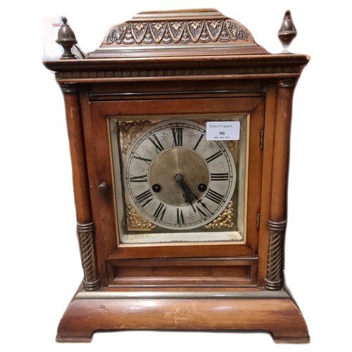 90 - Early 20th century German two train walnut cased architectural mantle clock with brass face having s... 