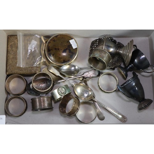 311 - Box of assorted napkin rings and miniature trophy cups, tea spoons etc, some silver. (B.P. 21% + VAT... 