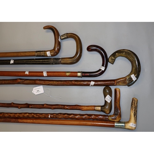 185 - Group of assorted walking sticks, various: horn handles and others.  (7)   (B.P. 21% + VAT)