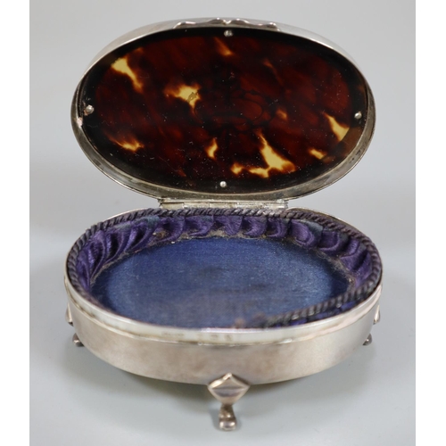 215 - Early 20th century silver and tortoise shell dressing table casket of oval form.   (B.P. 21% + VAT)