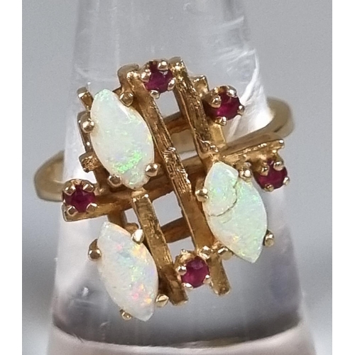 228 - 14ct gold modernist opal and red stone ring. 6.4g approx.  Ring size M.   (B.P. 21% + VAT)