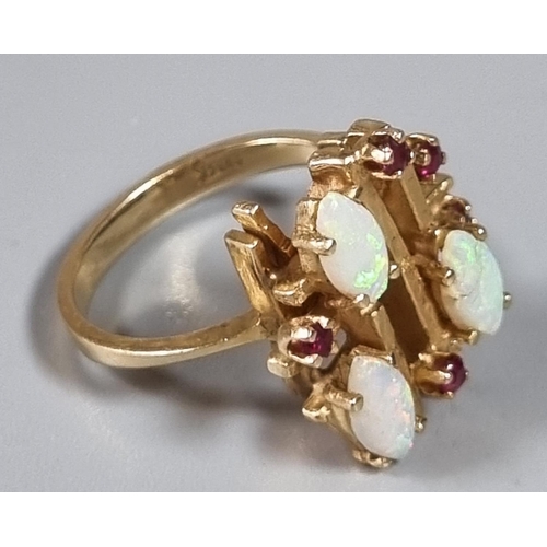 228 - 14ct gold modernist opal and red stone ring. 6.4g approx.  Ring size M.   (B.P. 21% + VAT)