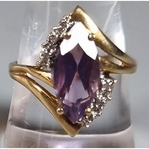 230 - 10ct gold diamond and purple stone ring.  3.4g approx.  Ring size Q.   (B.P. 21% + VAT)