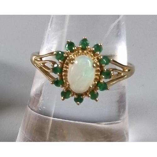 236 - 9ct gold opal and green stone ring.  2.2g approx.  Ring size N 1/2.    (B.P. 21% + VAT)