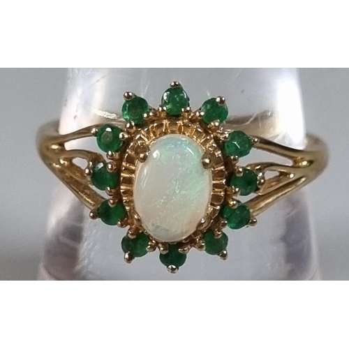 236 - 9ct gold opal and green stone ring.  2.2g approx.  Ring size N 1/2.    (B.P. 21% + VAT)