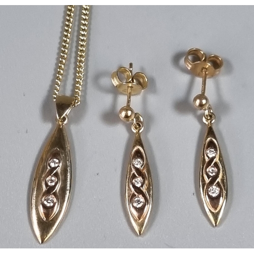 237 - 9ct gold oval and diamond pendant on chain with a pair of matching earrings.  Total weight 8.5g appr... 