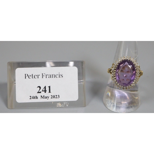 241 - 18ct gold amethyst and diamond ring.  Size O.  7g approx.