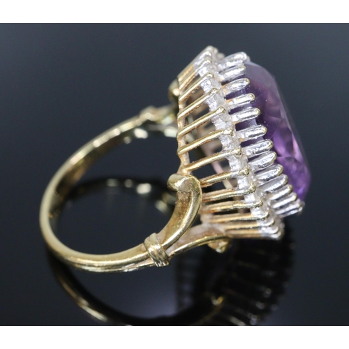 241 - 18ct gold amethyst and diamond ring.  Size O.  7g approx.