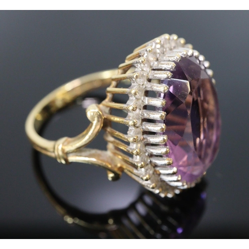 241 - 18ct gold amethyst and diamond ring.  Size O.  7g approx.