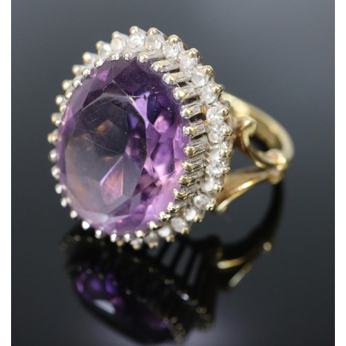 241 - 18ct gold amethyst and diamond ring.  Size O.  7g approx.