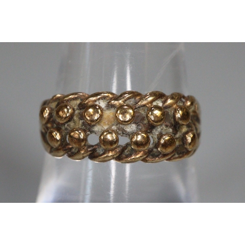 242 - 9ct gold dress ring.  Size N.  3g approx.   (B.P. 21% + VAT)