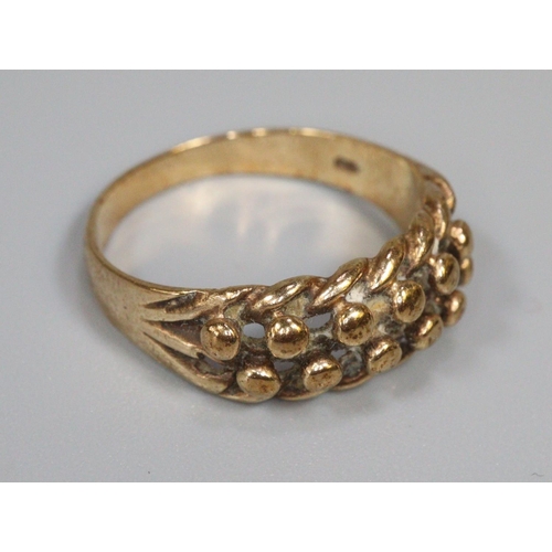 242 - 9ct gold dress ring.  Size N.  3g approx.   (B.P. 21% + VAT)