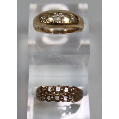 245 - 9ct gold three stone diamond ring together with a silver gilt ring.  4.6g approx.   (B.P. 21% + VAT)