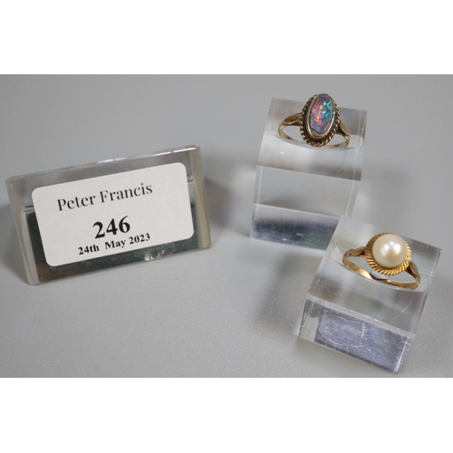 246 - Two yellow metal dress rings, one with opal stone.  3.2g approx.   (B.P. 21% + VAT)