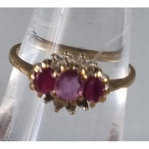 249 - 9ct gold ruby and diamond dress ring. 1.9g approx.  Ring size K.     (B.P. 21% + VAT)