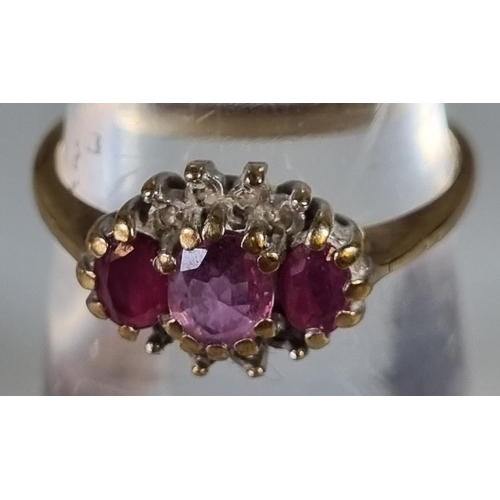 249 - 9ct gold ruby and diamond dress ring. 1.9g approx.  Ring size K.     (B.P. 21% + VAT)