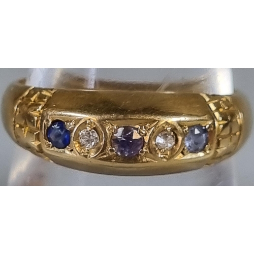 250 - 18ct five stone diamond and blue stone ring.  3g approx.  Ring size O.    (B.P. 21% + VAT)