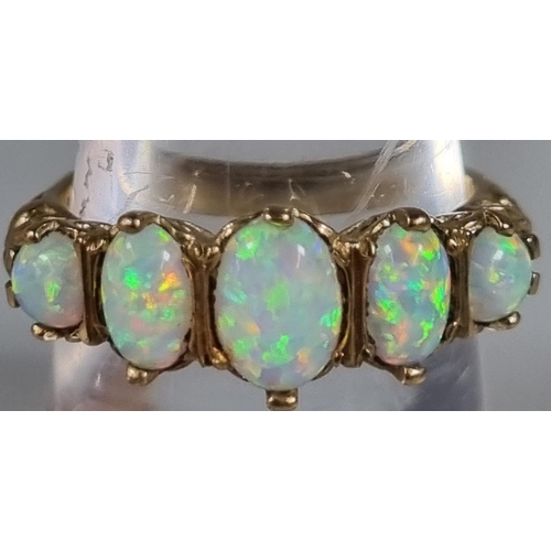 251 - 9ct gold five stone opal ring.  3.1g approx.  Ring size M 1/2.   (B.P. 21% + VAT)