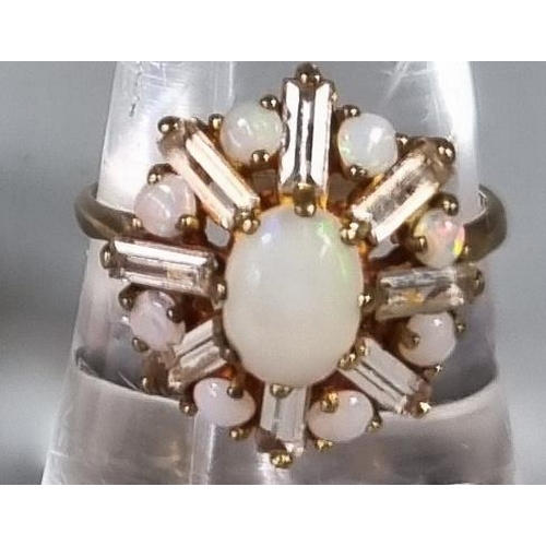 252 - 9ct gold opal flow head design ring.  3.6g approx.  Ring size P.   (B.P. 21% + VAT)