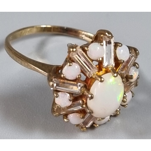 252 - 9ct gold opal flow head design ring.  3.6g approx.  Ring size P.   (B.P. 21% + VAT)