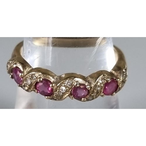 257 - 9ct gold red stone dress ring.  Ring size K 1/2.   (B.P. 21% + VAT)