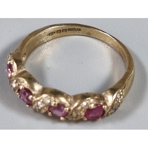 257 - 9ct gold red stone dress ring.  Ring size K 1/2.   (B.P. 21% + VAT)