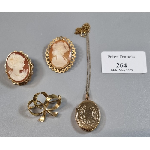 264 - 9ct gold locket pendant and chain together with two 9ct gold cameo brooches and a yellow metal ribbo... 