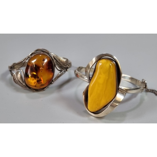 281 - Butterscotch amber silver bracelet together with another amber silver bracelet.  (2)   (B.P. 21% + V... 