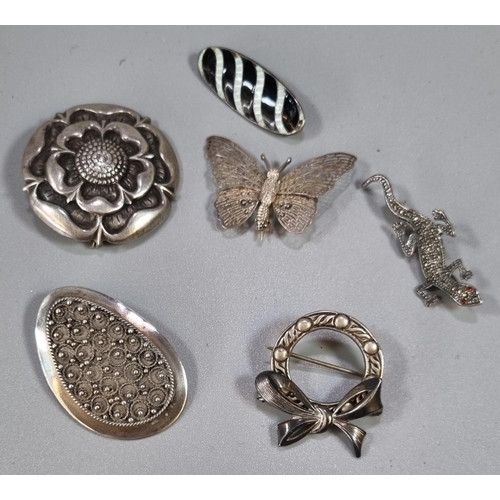 285 - Collection of six silver brooches, to include: filigree butterfly,  marcasite lizard etc.   (B.P. 21... 