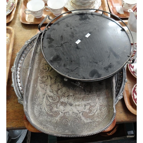 333 - Three metal trays; one glass with metal rim and handles and two silver plate with etched designs. (3... 