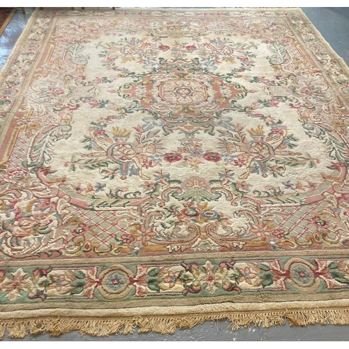 548 - Large Indian cream ground foliate decorated carpet.  385x197cm approx.   (B.P. 21% + VAT)