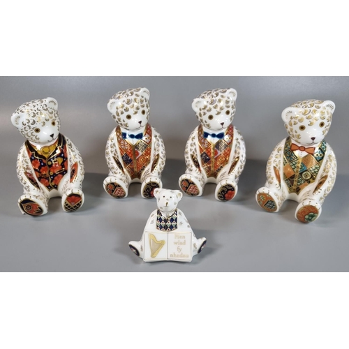 17 - Four Royal Crown Derby seated teddy bears with dicky bows, all in original boxes together with a Wel... 