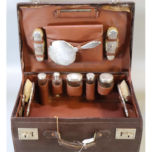 226 - Early 20th century leather cased silver gentleman's travelling vanity set to include: hand mirror, b... 