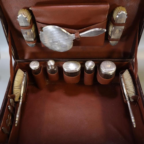 226 - Early 20th century leather cased silver gentleman's travelling vanity set to include: hand mirror, b... 